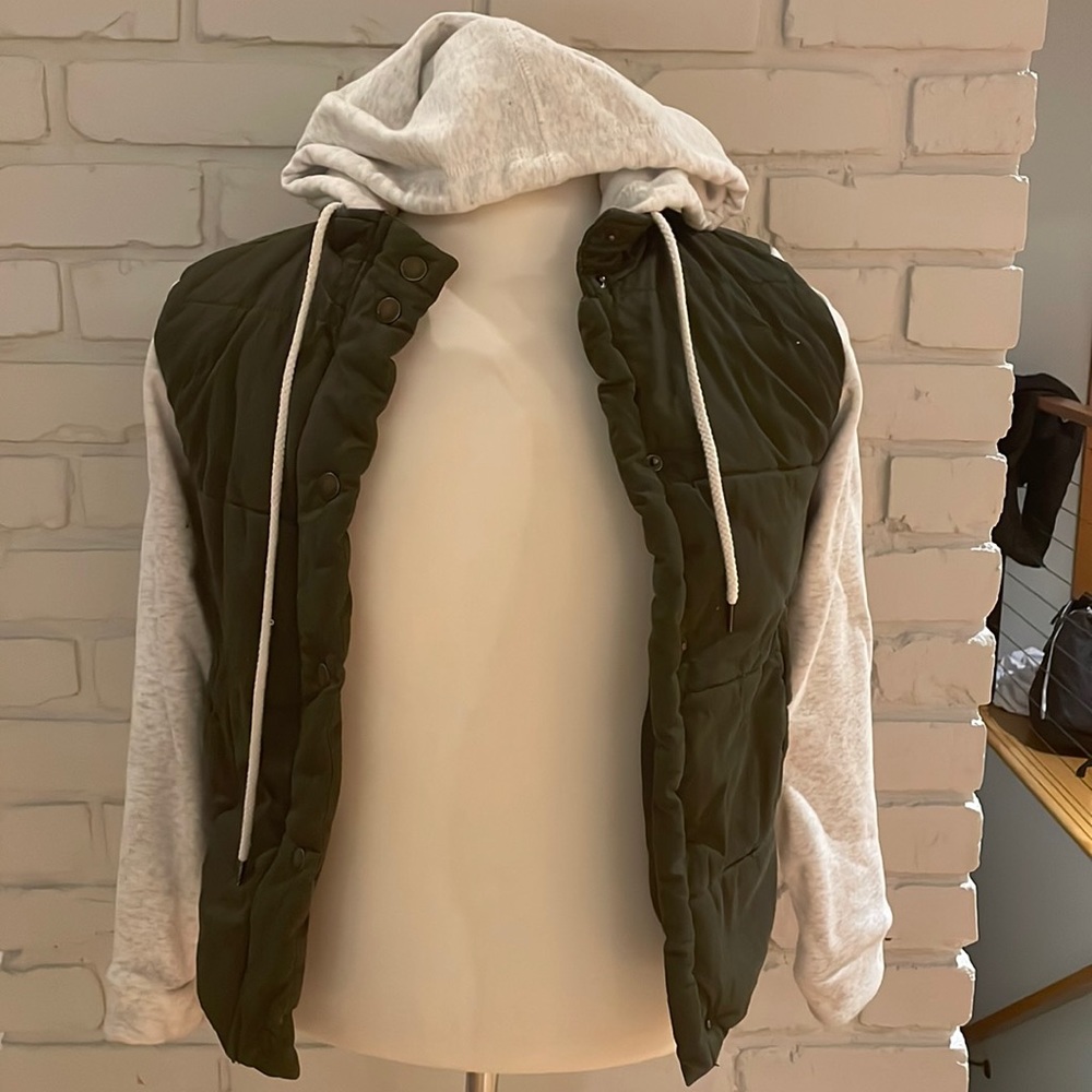 Jacket with hoodie and hoodie like sleeves